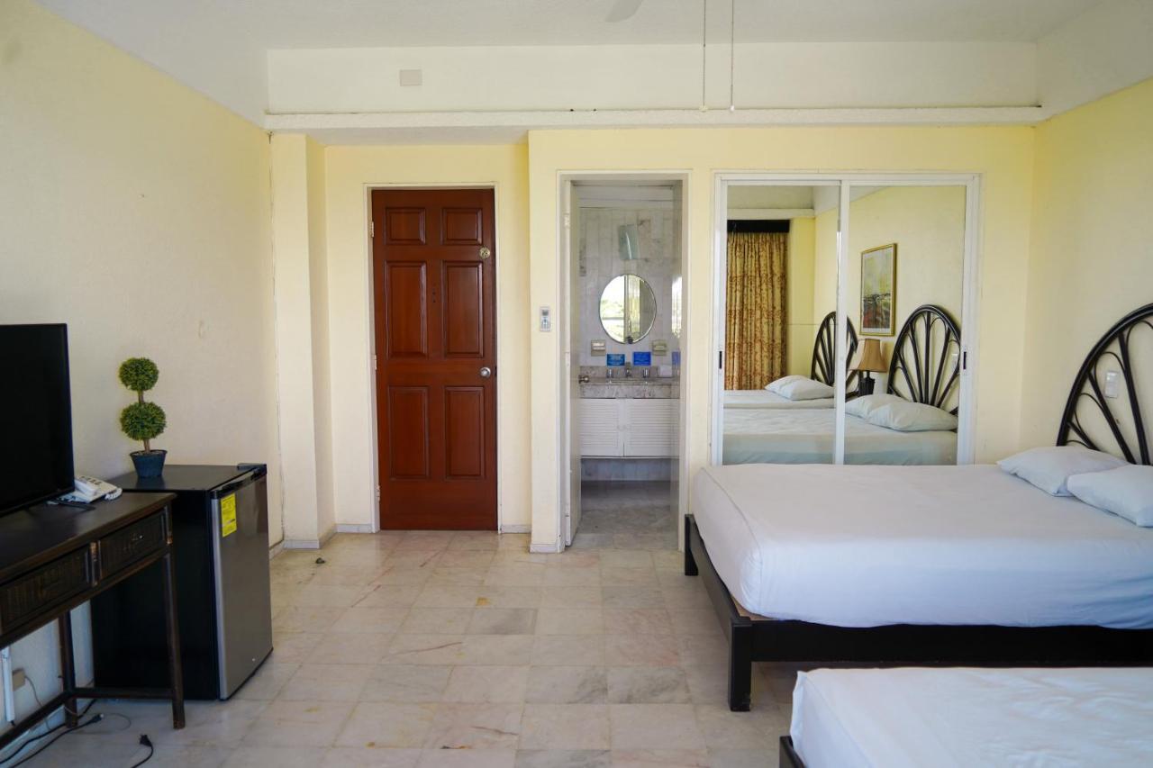 Luxury Caribbean Condos By Salvia Cancun Beachfront Bagian luar foto