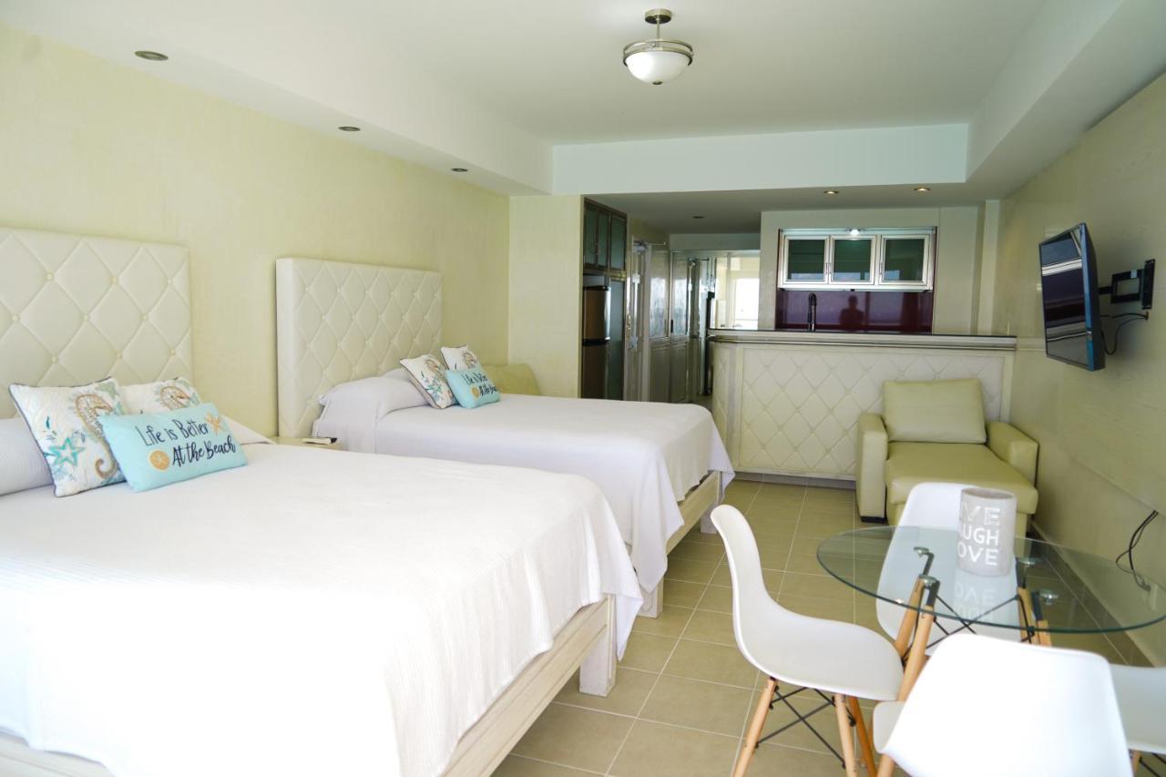 Luxury Caribbean Condos By Salvia Cancun Beachfront Bagian luar foto