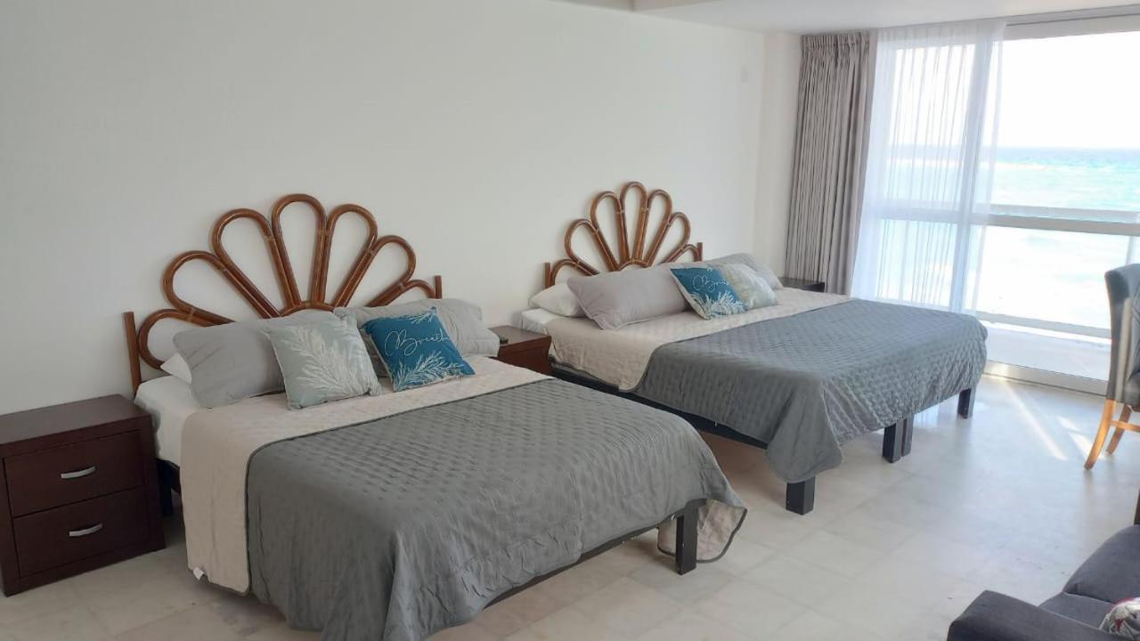 Luxury Caribbean Condos By Salvia Cancun Beachfront Bagian luar foto