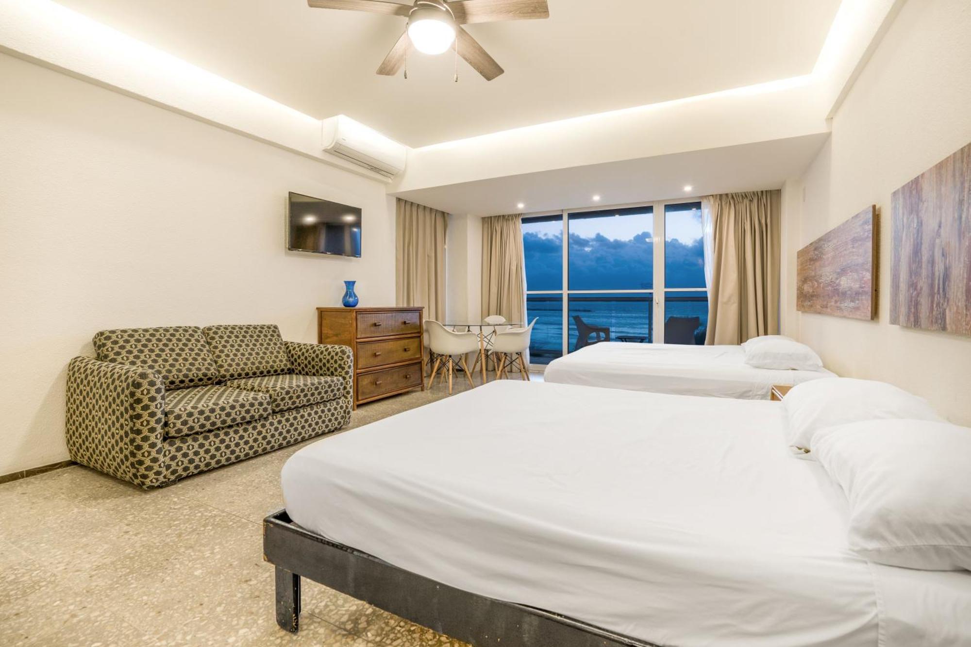 Luxury Caribbean Condos By Salvia Cancun Beachfront Bagian luar foto